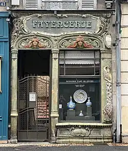 Facade of Avenue Charles-de-Gaulle no. 43, Nevers, France, by Georges-Théodore Renaud (architect) and Alexandre Bigot (ceramist) (1905)[221]