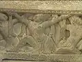 This image of a male dancer is on the riser of a step leading onto the Mỹ Sơn E1 pedestal.