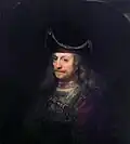 Ferdinand Bol, A Man in a Fancy Robe and a Tall Cap Strung with Pearls, c. 1643