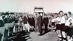 Two football teams lining up