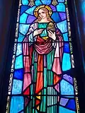 Detail of Mary Magdalene pane.