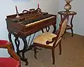 Portable melodeon[44] or lyre-leg melodeon[43]