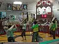 Men working out at Zurkhaneh (House of Strength) in Iran.