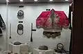 Coat, belt buckles and decorations