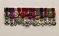 Miniature medal bar of Drees, showing all of his foreign and domestic decorations, as well as the grade.