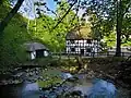 The old water mill "Skovmøllen."