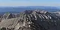 The top of Mount Pickering centered, as seen from Mount Whitney.