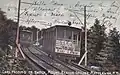 The railway's two cars passing each other in this circa 1905 postcard
