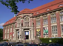 Photograph of a multi story brick building