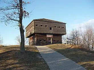 Log building called a blockhouse with tightly fitting beams.