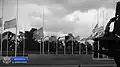 The flags in front of the NATO Star are lowered to half-mast the day after the 2021 Kabul airport attack in which 13 members of the United States Armed Forces were killed[6], August 27, 2021