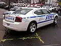 A Highway Patrol Dodge Charger radio motor patrol (RMP) car.