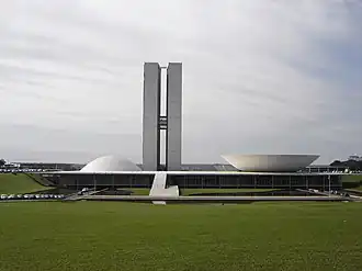 Front façade and lawn, showing the twin towers