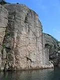 Olavsund strait, where a face can be seen in the rock wall