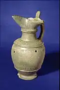 Oinochoe with gray body, with equine decorations 6th century. BC Tomb 48, Poggio Sommavilla Necropolis.