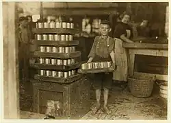 Image 14Child labor at J.S. Farrand Packing Company in Baltimore, 1909. Photo by Lewis Hine. (from History of Baltimore)