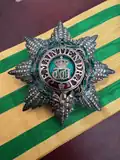 The Grand Cross star and sash.