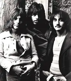 Left to right: Louis Dambra, Gary Justin, John&nbsp;Garner, c. 1971