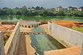Otamiri River showing the drainage system through which effluent is discharged into the river.