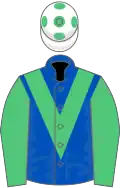 Royal blue, emerald green chevron and sleeves, white cap, emerald green spots