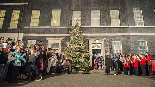 Theresa May switches on the lights, 2017.