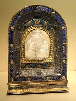 Pax with the Annunciation in shell cameo, gilded silver, copper, enamel. German or Netherlandish shell carving (c. 1500), setting probably Italian (c. 1500–1520)