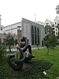 In the foreground is a calligraphic sculpture titled He Ping (和平), Chinese for "peace", by Singaporean artist Chua Boon Kee.