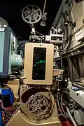 The DP70 pedestal and mechanism seen from the operating side, with the mechanism cover closed.