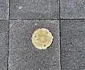 Medallion in the Independence Square of Quito.