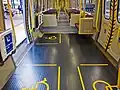 EMU allocated spaces, vestibule and priority seats.