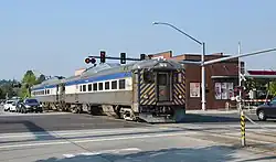 TriMet's RDC train 1702+1711 on Lombard Avenue in Beaverton in 2017