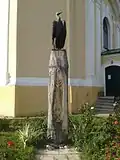 Turul monument in front of the church