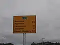 Distance sign (furthest on top)