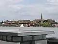 Sun Alliance offices in Horsham, behind the spire that sits in one of its recesses