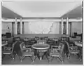 The Cabin-class lounge with Hildreth Meière's mural Mississippi in the background.