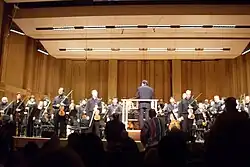 Symphony performing inside a band shell