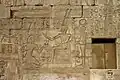 Khonsu behind Rameses III offering to Amun, Temple of a million years of Rameses III