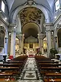 G.B. Resasco (architect), Rubattino-Rebisso chapel, Staglieno Cemetery, Genoa, 1870. The spire contains stained-glass windows created by De Matteis in 1871.