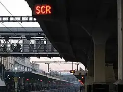 Platform 1, with a light-blue awning