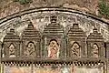 The massive terracotta panel in Shiva Durga temple