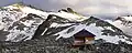 Snowbird Hut with Higher Spire (upper left) and Lower Spire (center, top)