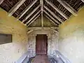 15th century porch & south door with rare 'stepped' cross