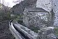 Canal running alongside the apse.