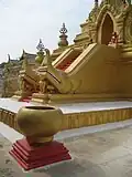 Stairs to the upper terrace of Kuthodaw guarded by mythical creatures