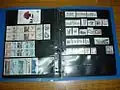Ring-binder of loose-leaf stock pages storing stamp booklets and booklet panes