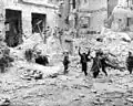 The Jews are being pulled out of the basements by Wehrmacht sappers and SS troops.