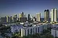 Skyline from the West in 2015. On the left side of the photo some of the oldest high rises in the city, dating to the 1960s and 1970s, can be seen.