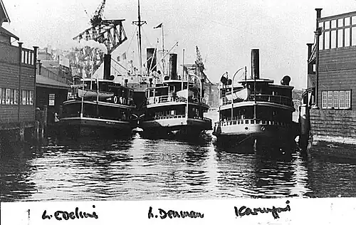 With Lady Edeline and Karingal at Circular Quay as the Sydney Harbour Bridge nears completion, 1930