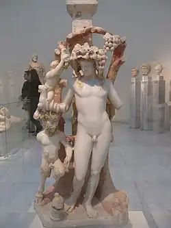 Marble table support adorned by a group including Dionysos, Pan and a Satyr, 170-180 AD