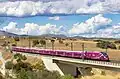 Train operating an Avlo service near Tres Cantos, Madrid